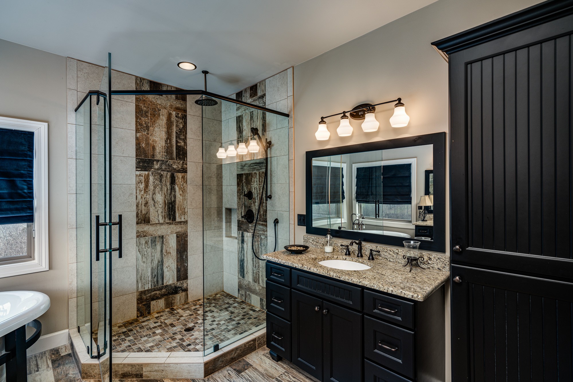 3639 Swan Ridge Road Celina, TN 38551 - Photo 24 of 37 a bathroom with a sink and a mirror