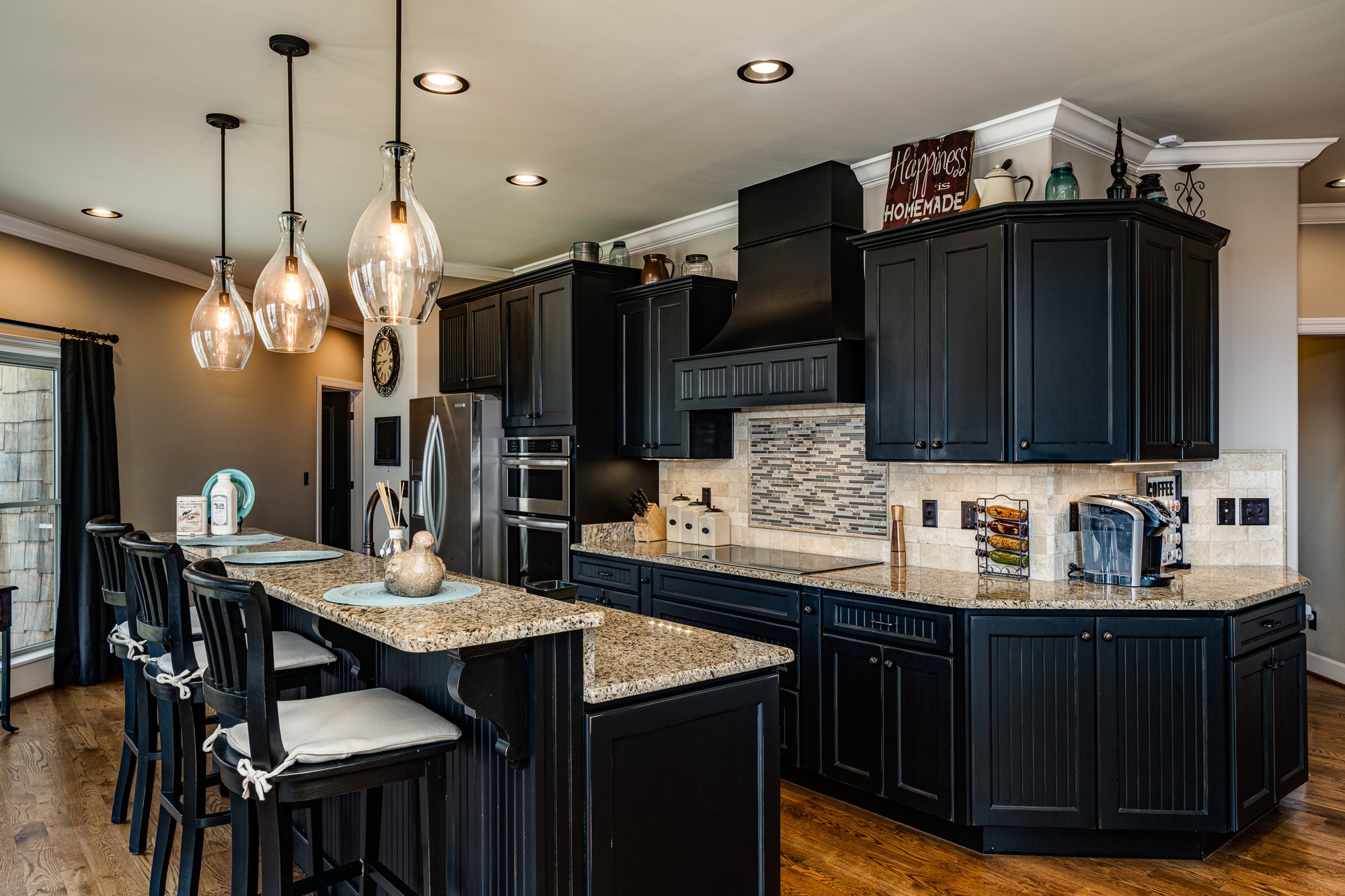 3639 Swan Ridge Road Celina, TN 38551 - Photo 10 of 37 a kitchen with granite countertop a sink cabinets and wooden floor
