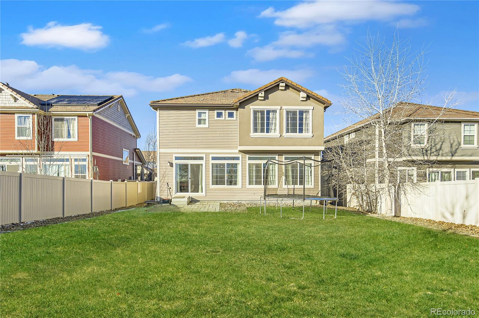 3423 Rosewood Lane Johnstown, CO 80534 - Photo 10 of 10 a front view of a house with a yard