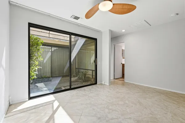 an empty room with window