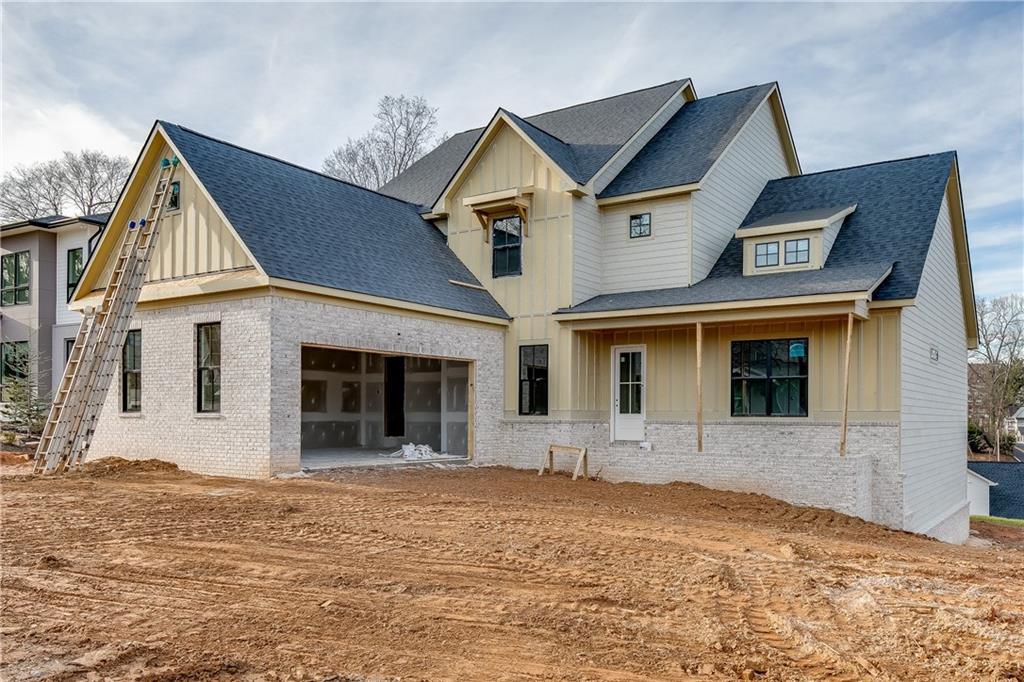 39 Cloud Street Buford, GA 30518 - Photo 1 of 1 a front view of a house with a yard