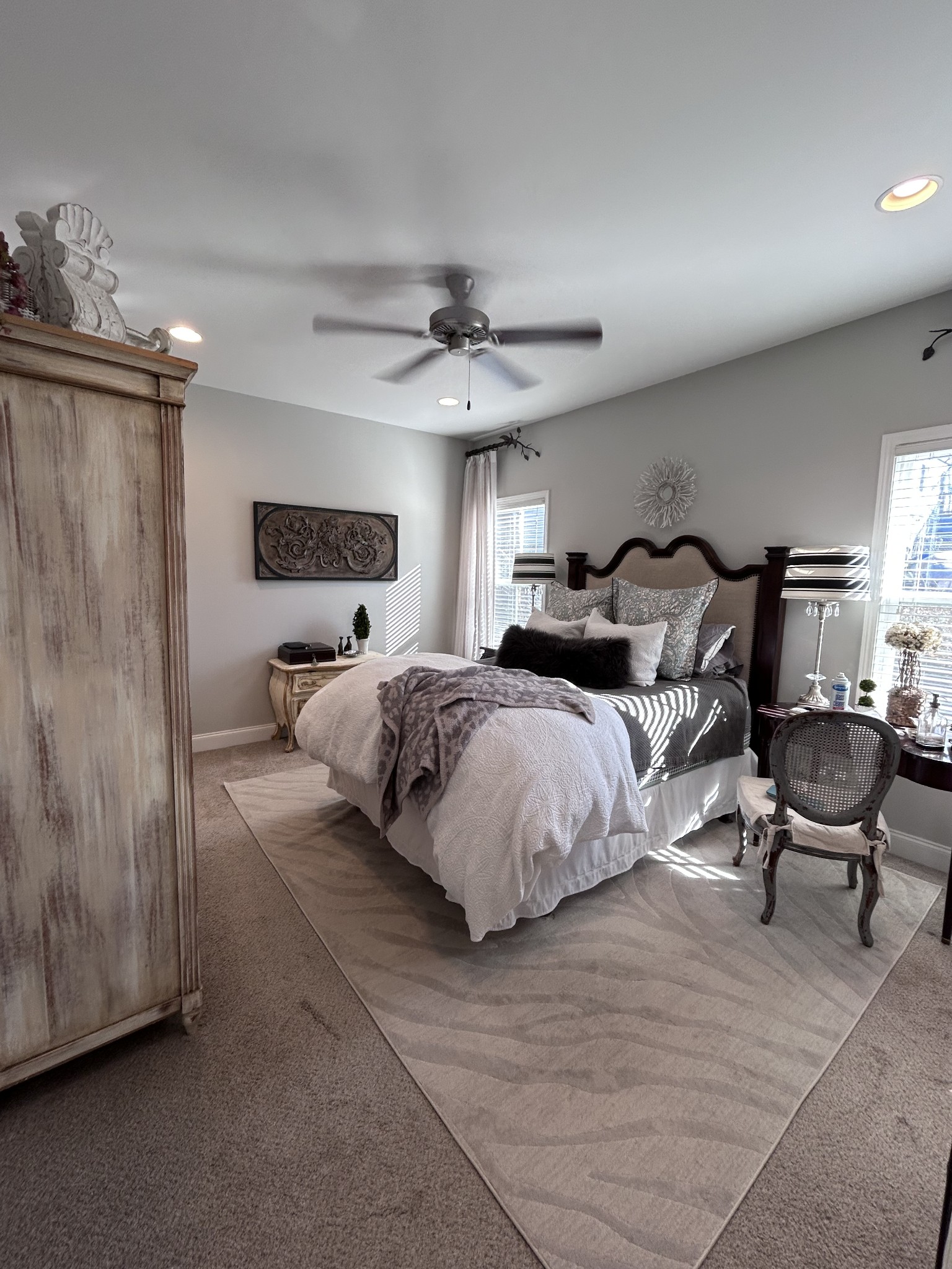 207 North Walnut Street Springfield, TN 37172 - Photo 9 of 14 a spacious bedroom with a bed and a chandelier