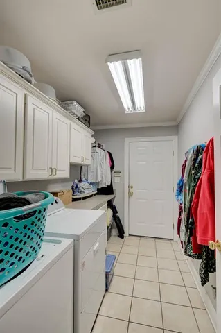 a view of a kitchen with storage and utility