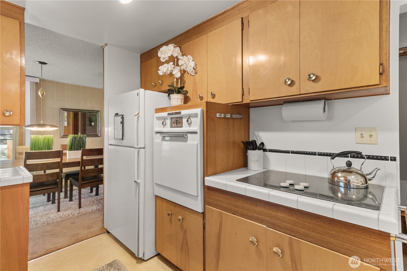 15829 4th Avenue Southwest Burien, WA 98166 - Photo 14 of 37 a kitchen with stainless steel appliances granite countertop a refrigerator and a stove