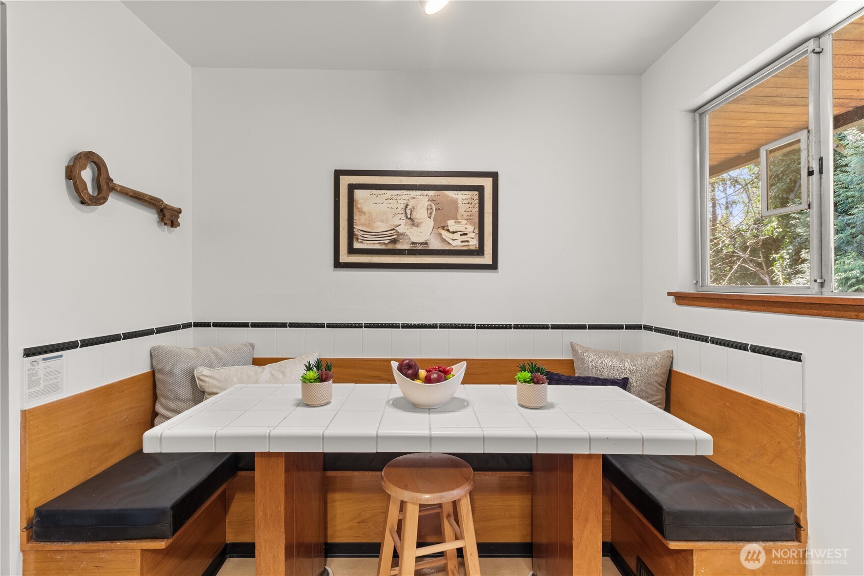 15829 4th Avenue Southwest Burien, WA 98166 - Photo 16 of 37 a view of a dining room with furniture and window