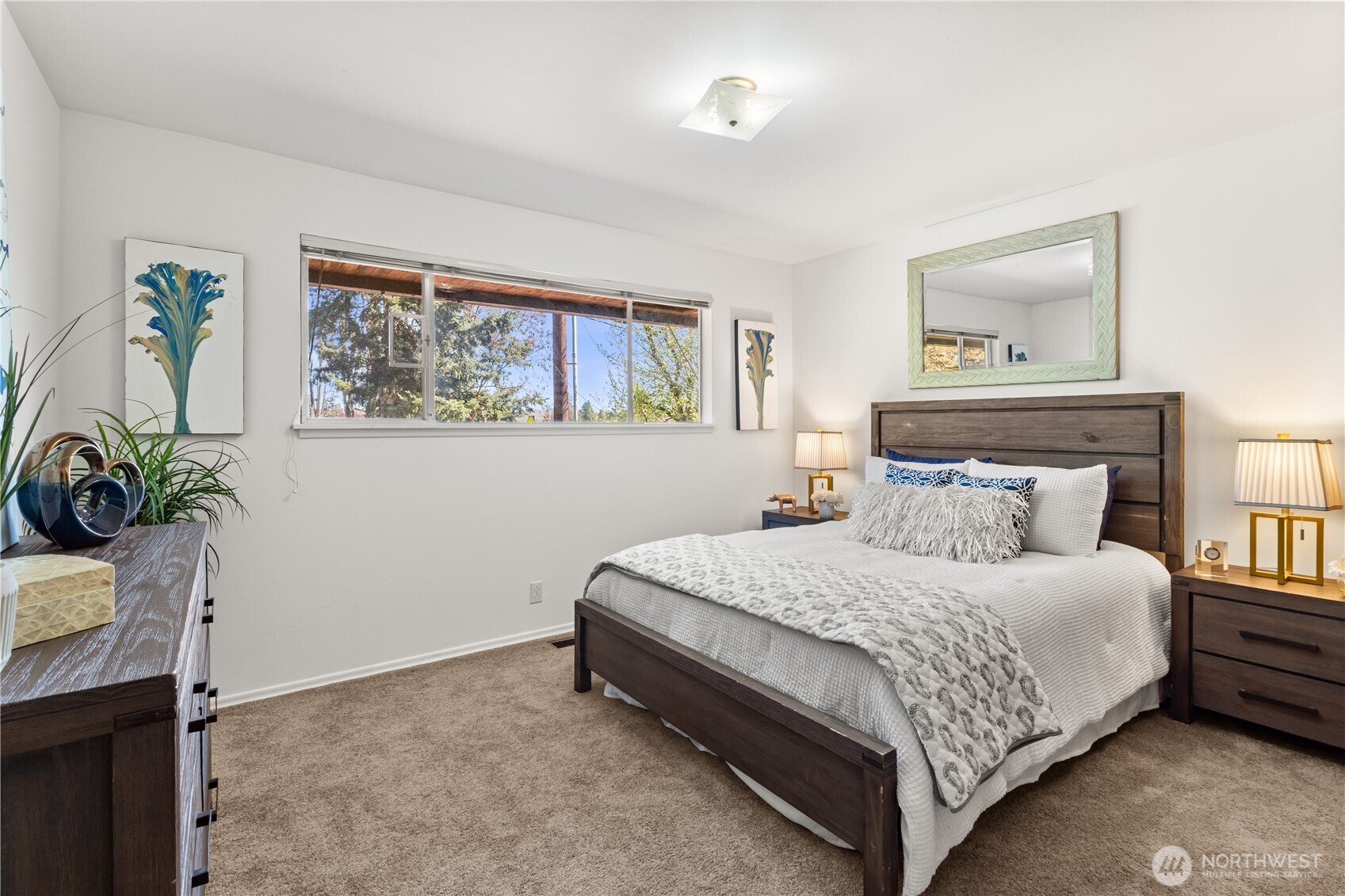 15829 4th Avenue Southwest Burien, WA 98166 - Photo 18 of 37 a bedroom with a bed table and a window