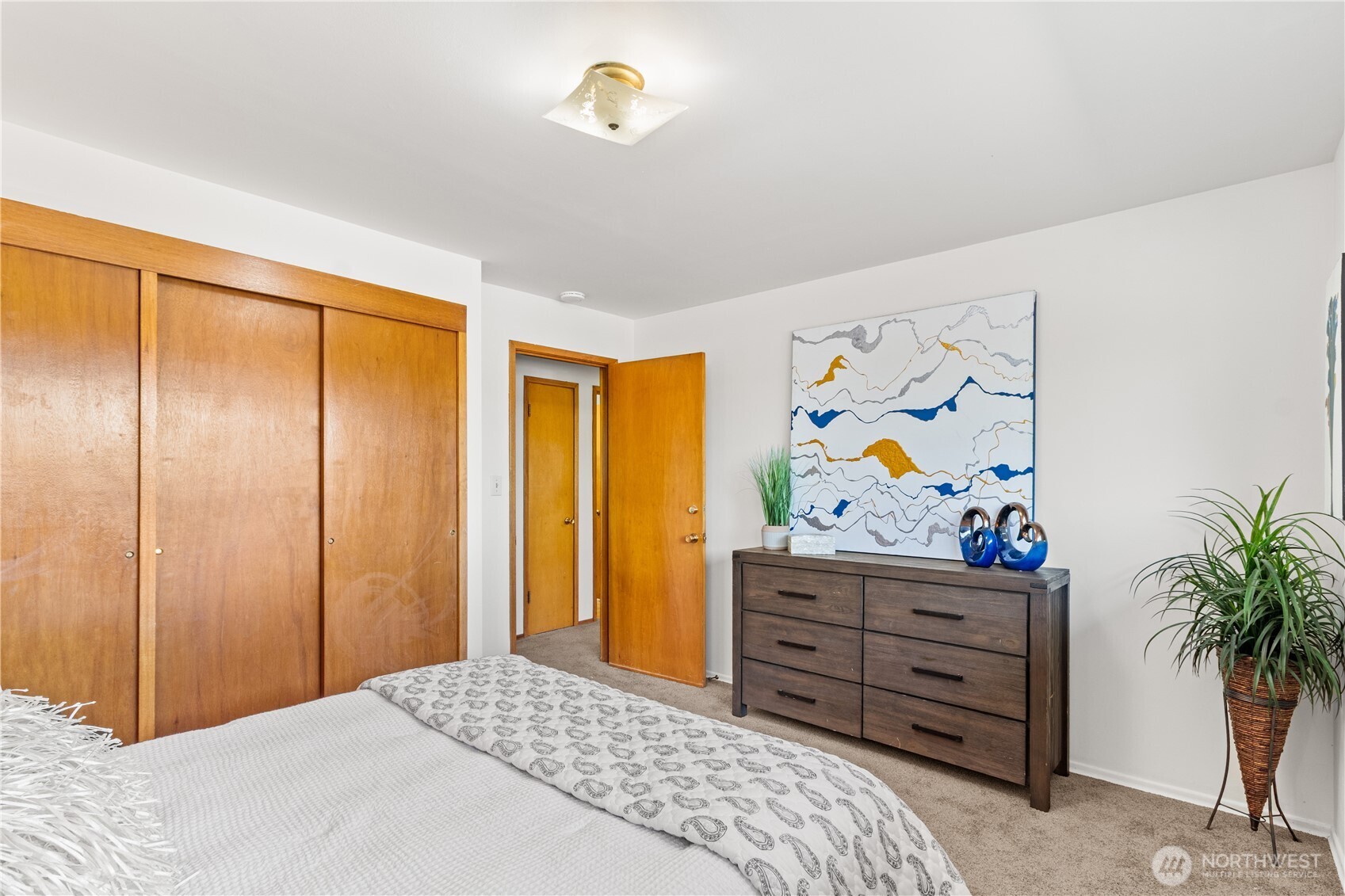 15829 4th Avenue Southwest Burien, WA 98166 - Photo 22 of 37 a bedroom with a bed and furniture