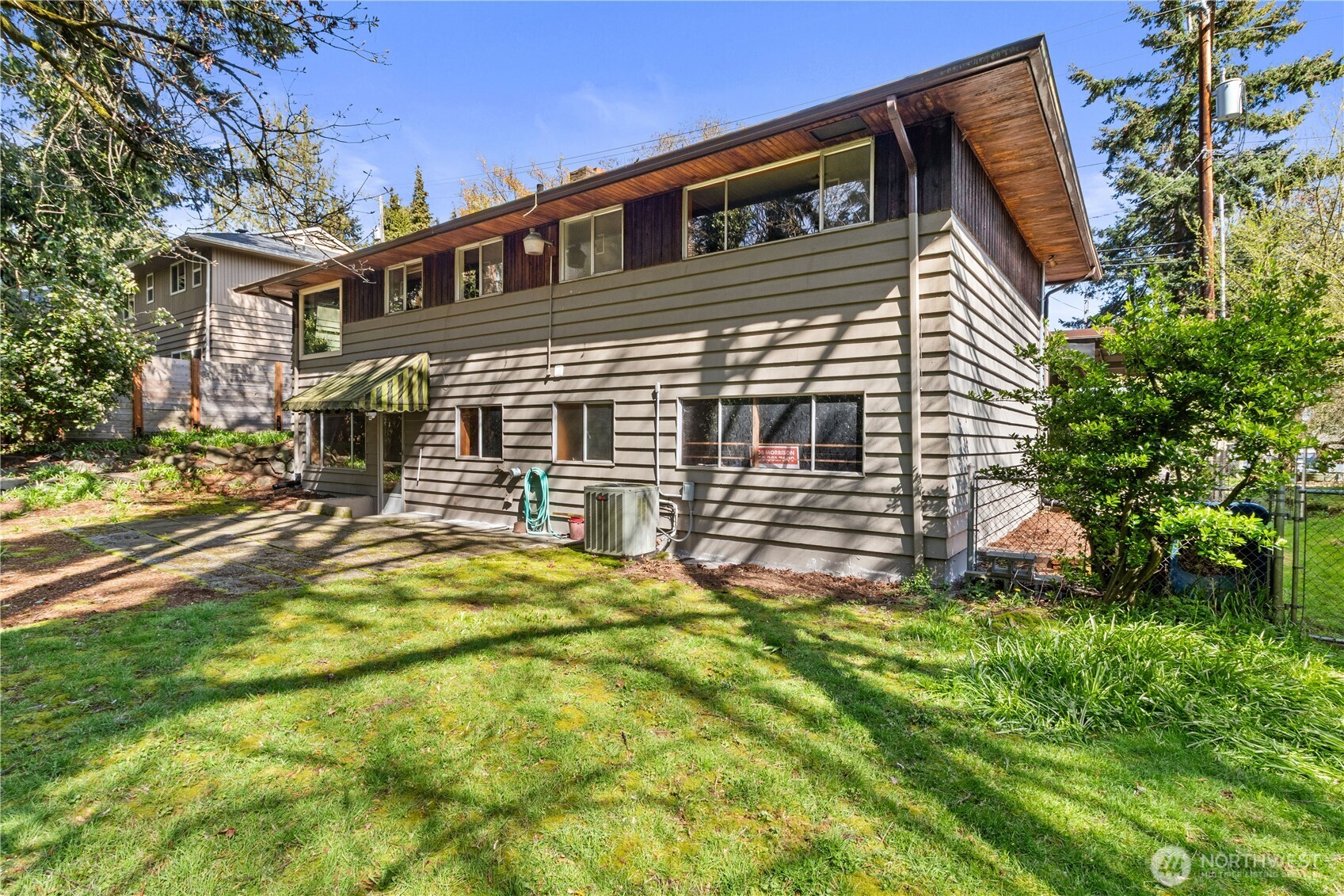 15829 4th Avenue Southwest Burien, WA 98166 - Photo 31 of 37 a front view of a house with a yard
