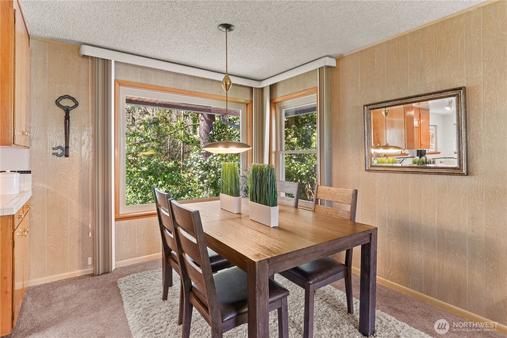 15829 4th Avenue Southwest Burien, WA 98166 - Photo 10 of 37 a view of a dining room with furniture window and outside view