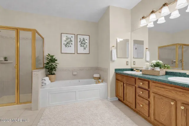 a bedroom with bed and window