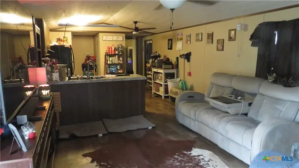 a living room filled with furniture