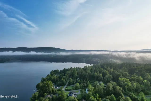 a view of a swimming pool and an outdoor space