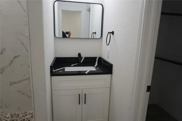 a sign that is on the side of a road