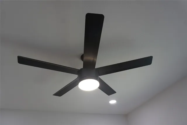 a view of a room with lots of furniture and wooden floor