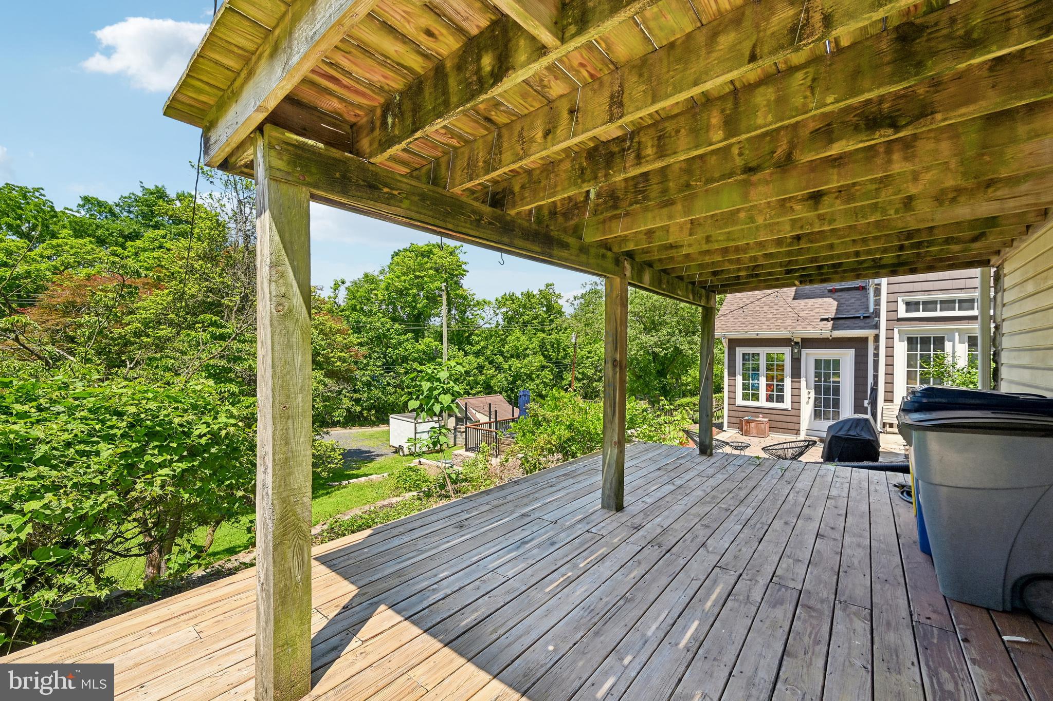 5702 Falls Road Baltimore, MD 21209 - Photo 37 of 49 a view of a patio with wooden floor