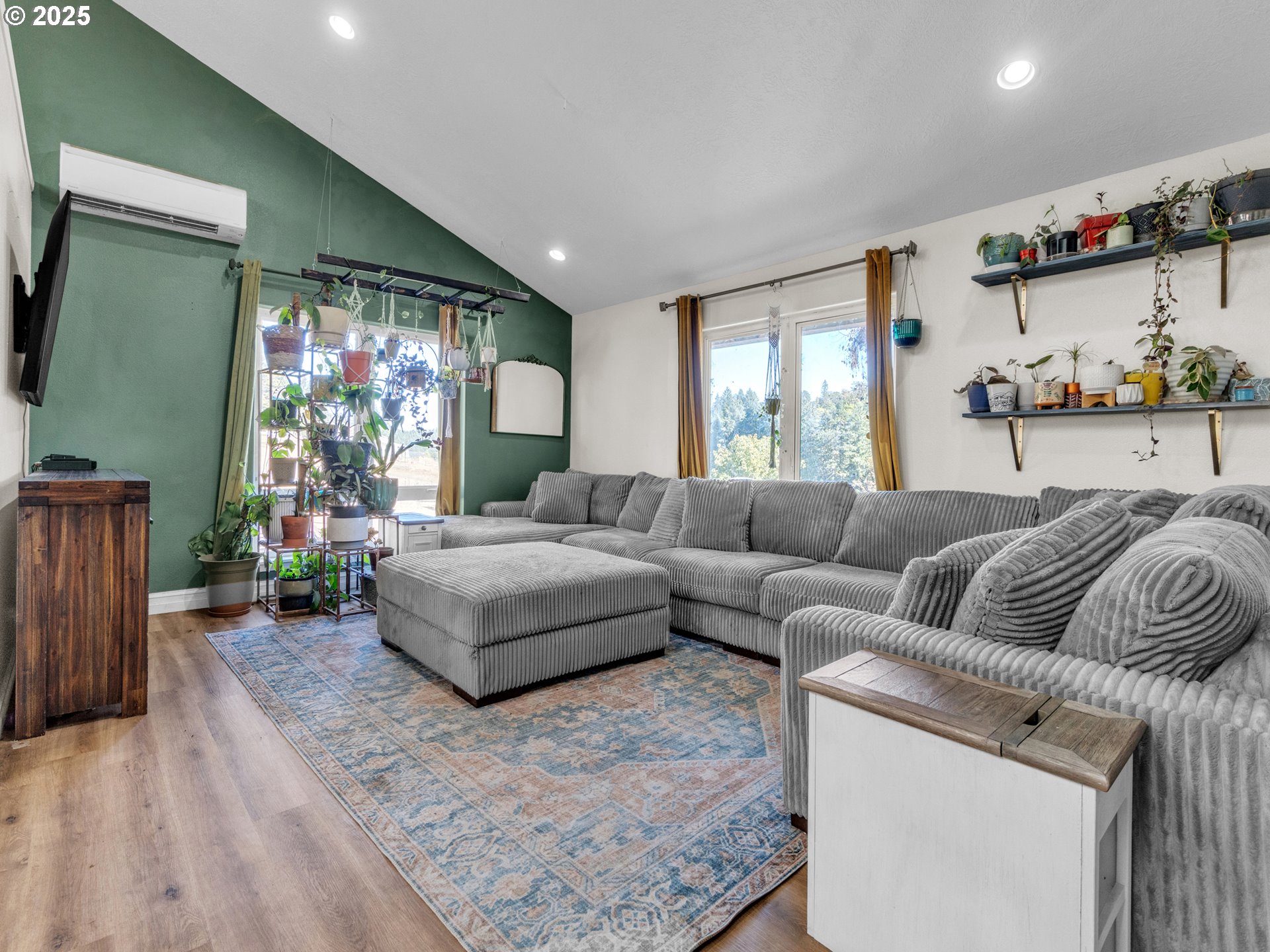 845 Perrydale Road Dallas, OR 97338 - Photo 7 of 20 a living room with furniture a window and a flat screen tv