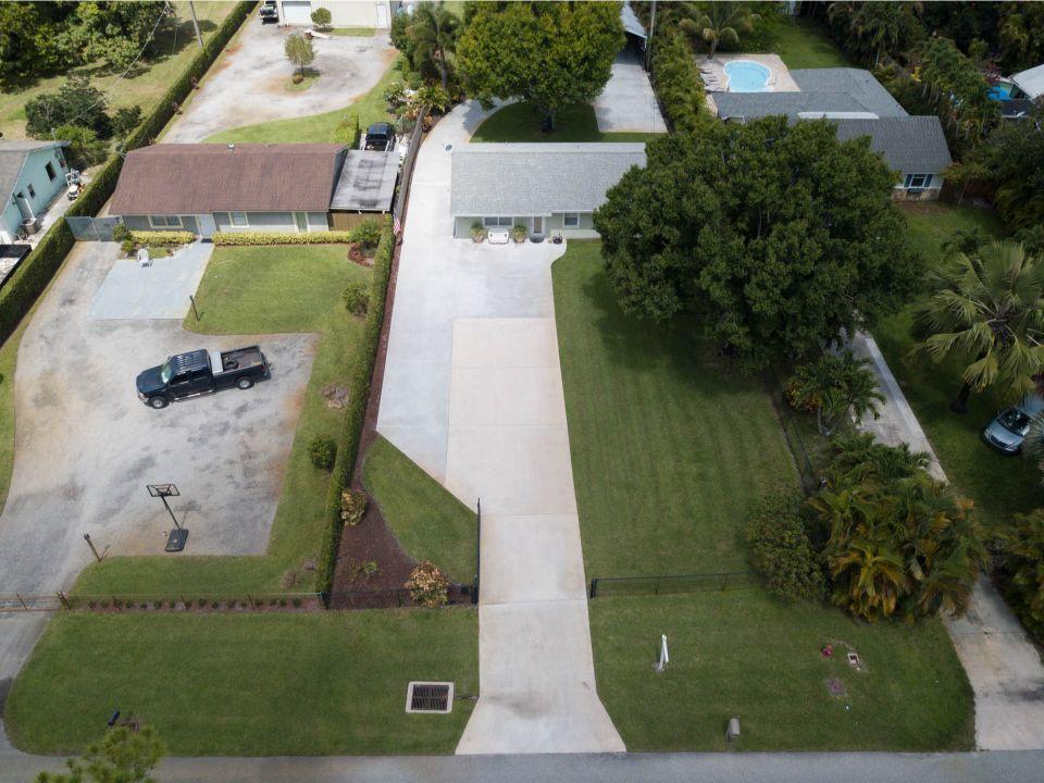 5547 3rd Road Lake Worth, FL 33467 - Photo 23 of 34 an aerial view of a house