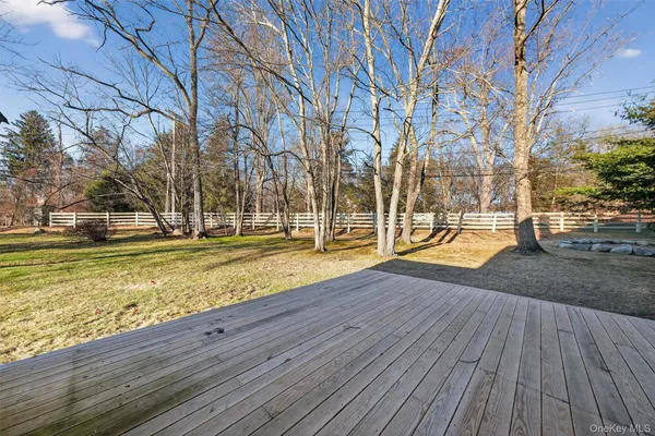 a view of yard with wooden floor