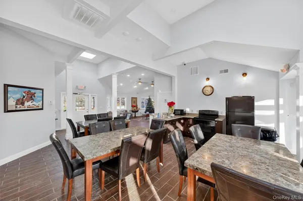a view of a dining room with furniture