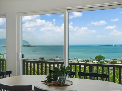 a view of a balcony with an ocean view