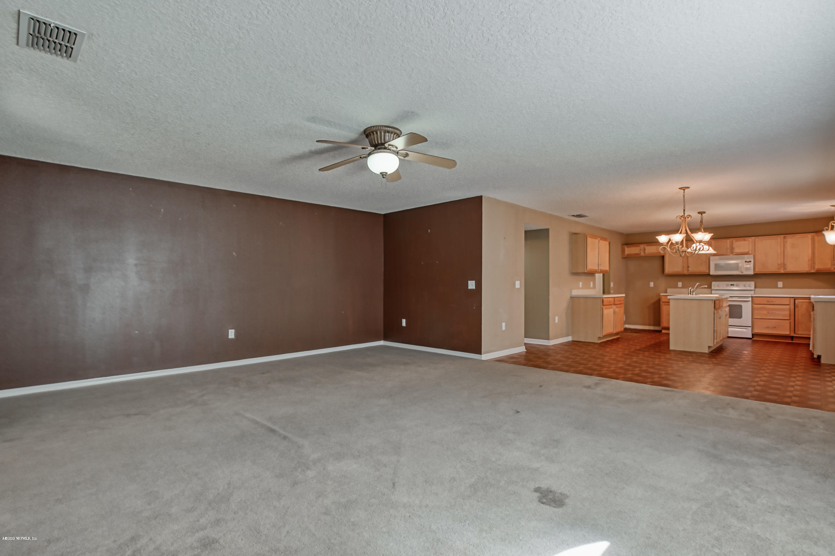 76235 Longleaf Loop Yulee, FL 32097 - Photo 2 of 29 family room