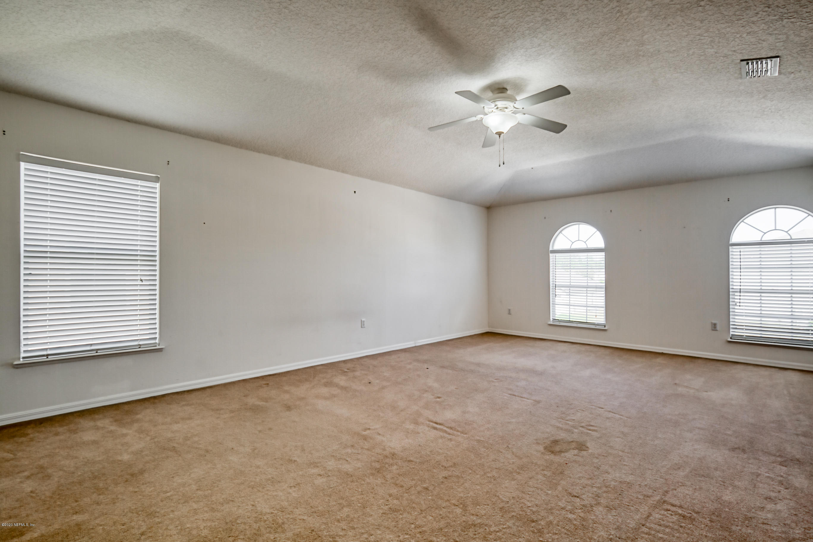 76235 Longleaf Loop Yulee, FL 32097 - Photo 4 of 29 master bedroom