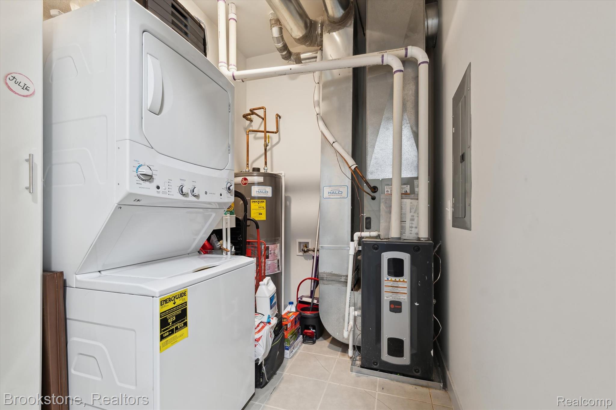 804 North Main Street, Unit 2C Rochester, MI 48307 - Photo 19 of 23 Laundry room with stacked washer / drying machine,