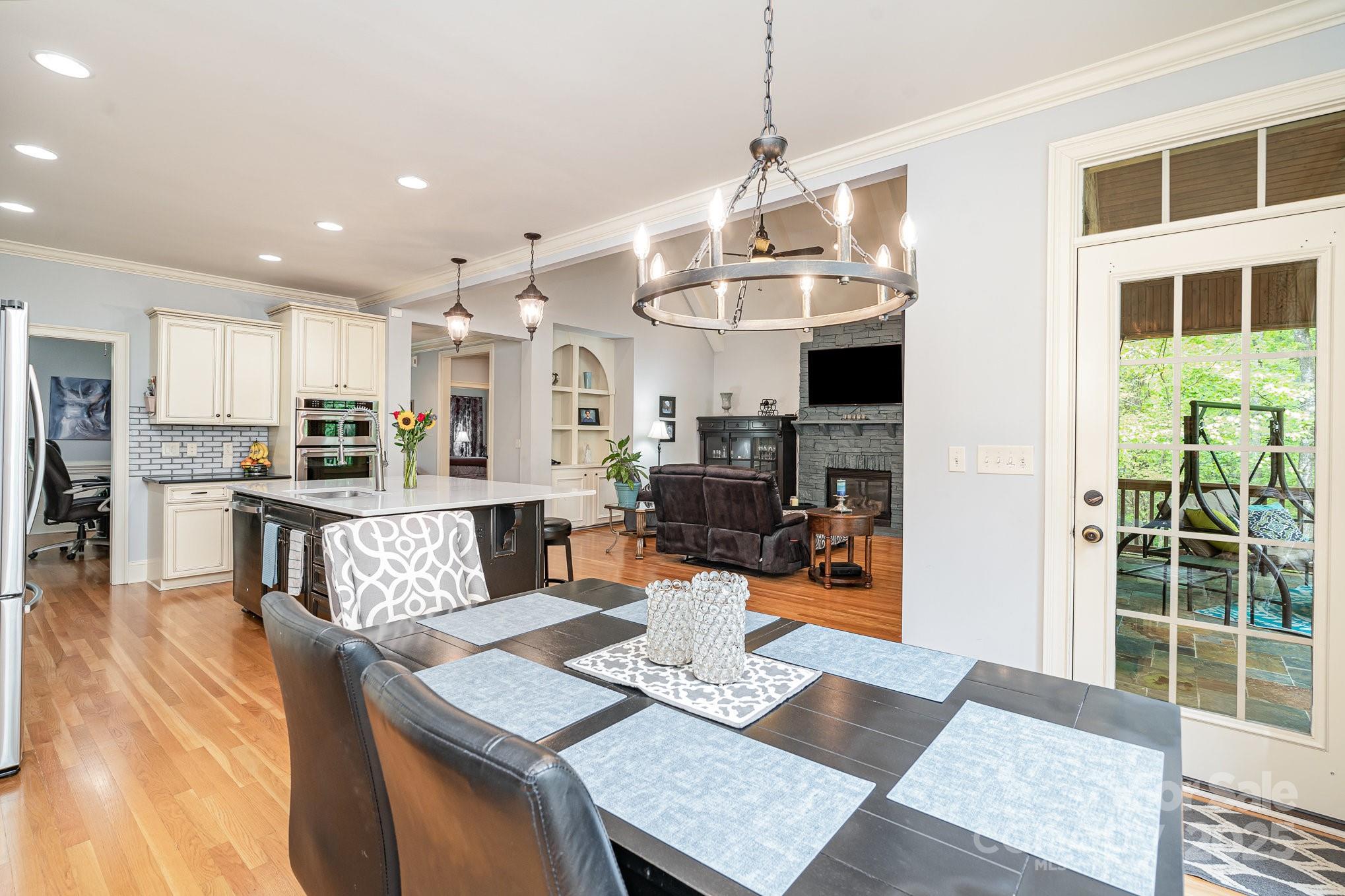 112 Spring Branch Road Fort Mill, SC 29715 - Photo 25 of 43 a living room with stainless steel appliances kitchen island granite countertop furniture and a view of kitchen