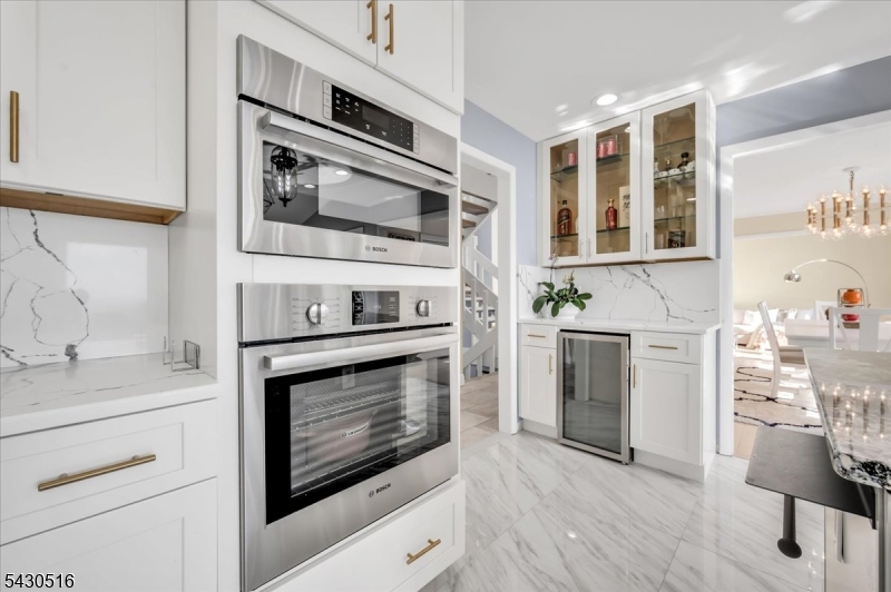 950 Sunset Ridge Bridgewater, NJ 08807 - Photo 14 of 41 a kitchen with cabinets stainless steel appliances and a sink