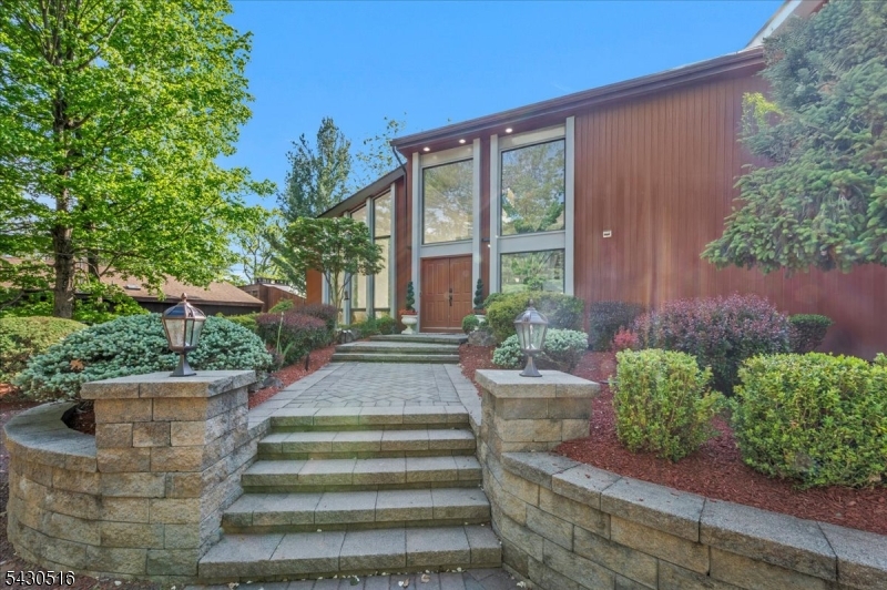 950 Sunset Ridge Bridgewater, NJ 08807 - Photo 2 of 41 a view of a house with potted plants