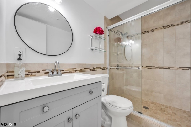 950 Sunset Ridge Bridgewater, NJ 08807 - Photo 22 of 41 a bathroom with a sink toilet and shower