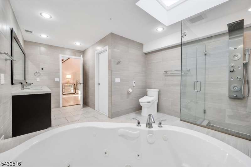 950 Sunset Ridge Bridgewater, NJ 08807 - Photo 33 of 41 a bathroom with a sink shower and a mirror