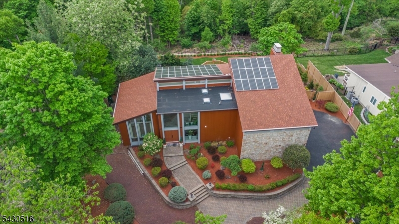 950 Sunset Ridge Bridgewater, NJ 08807 - Photo 38 of 41 an aerial view of a house with garden space and lake view
