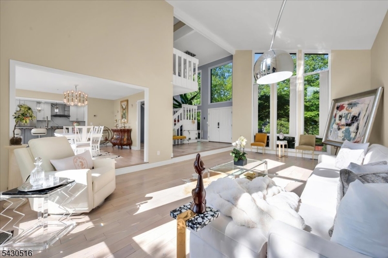 950 Sunset Ridge Bridgewater, NJ 08807 - Photo 7 of 41 a living room with furniture large window and wooden floor