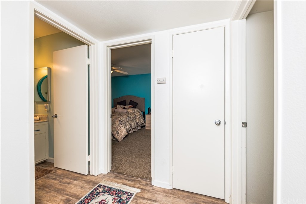 28241 Winged Foot Drive Menifee, CA 92586 - Photo 15 of 25 a view of a bedroom bathroom and front door