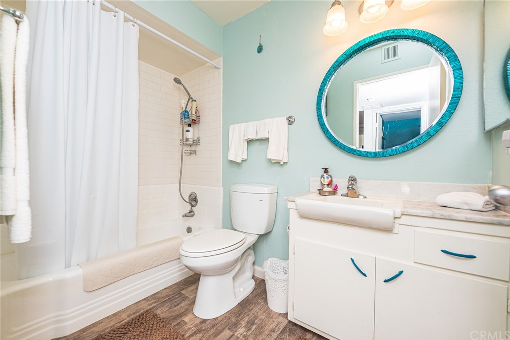 28241 Winged Foot Drive Menifee, CA 92586 - Photo 16 of 25 a bathroom with a sink and a mirror