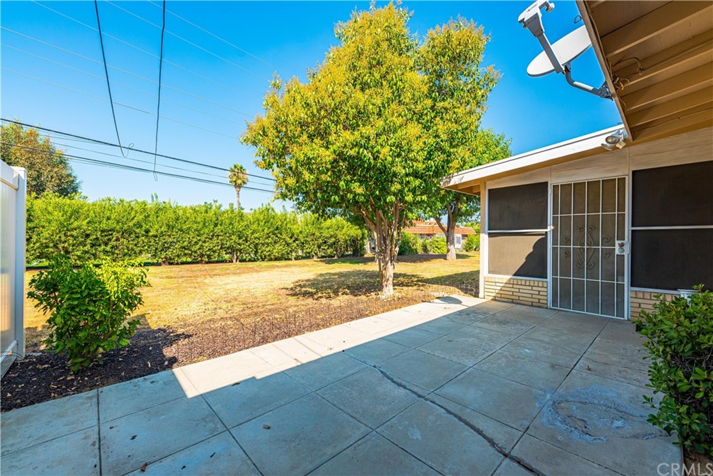 28241 Winged Foot Drive Menifee, CA 92586 - Photo 21 of 25 a view of a backyard house with potted plants