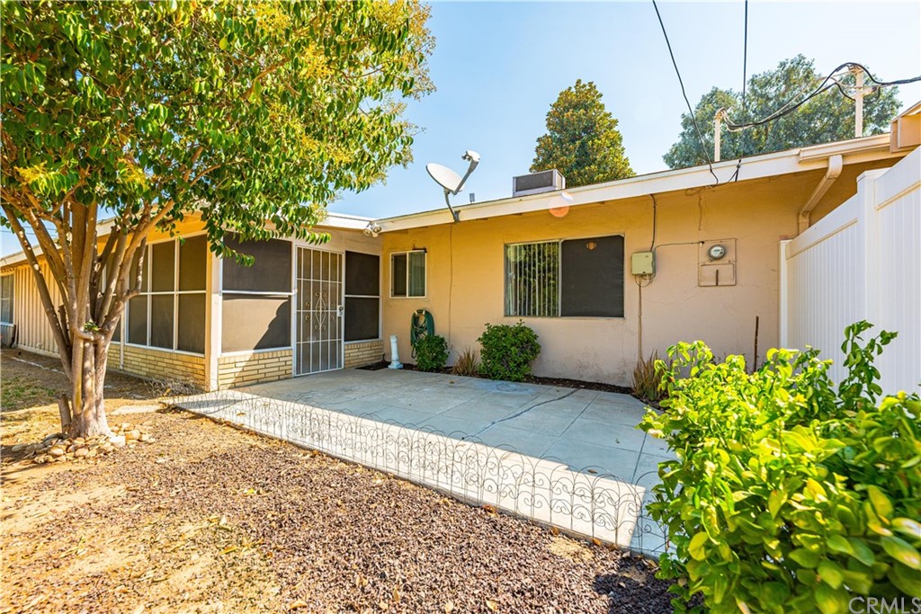 28241 Winged Foot Drive Menifee, CA 92586 - Photo 22 of 25 a front view of a house with garden