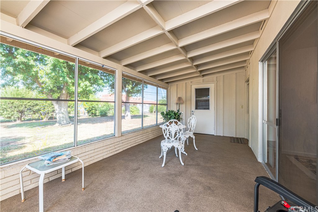 28241 Winged Foot Drive Menifee, CA 92586 - Photo 10 of 25 a dining room with furniture water view and a large window
