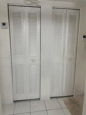 a view of bathroom with door