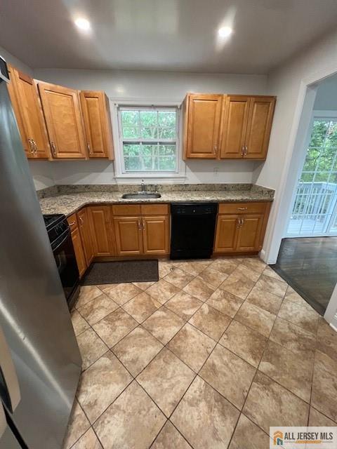 139 Rues Lane East Brunswick, NJ 08816 - Photo 4 of 17 a kitchen with a sink and a window in it