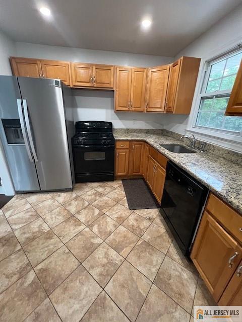 139 Rues Lane East Brunswick, NJ 08816 - Photo 5 of 17 a kitchen with granite countertop a refrigerator and a sink