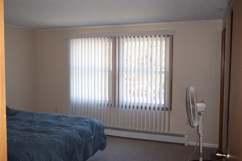 235 Turkey Hill Road Rutland, MA 01543 - Photo 6 of 9 a bed sitting in a bedroom next to a window