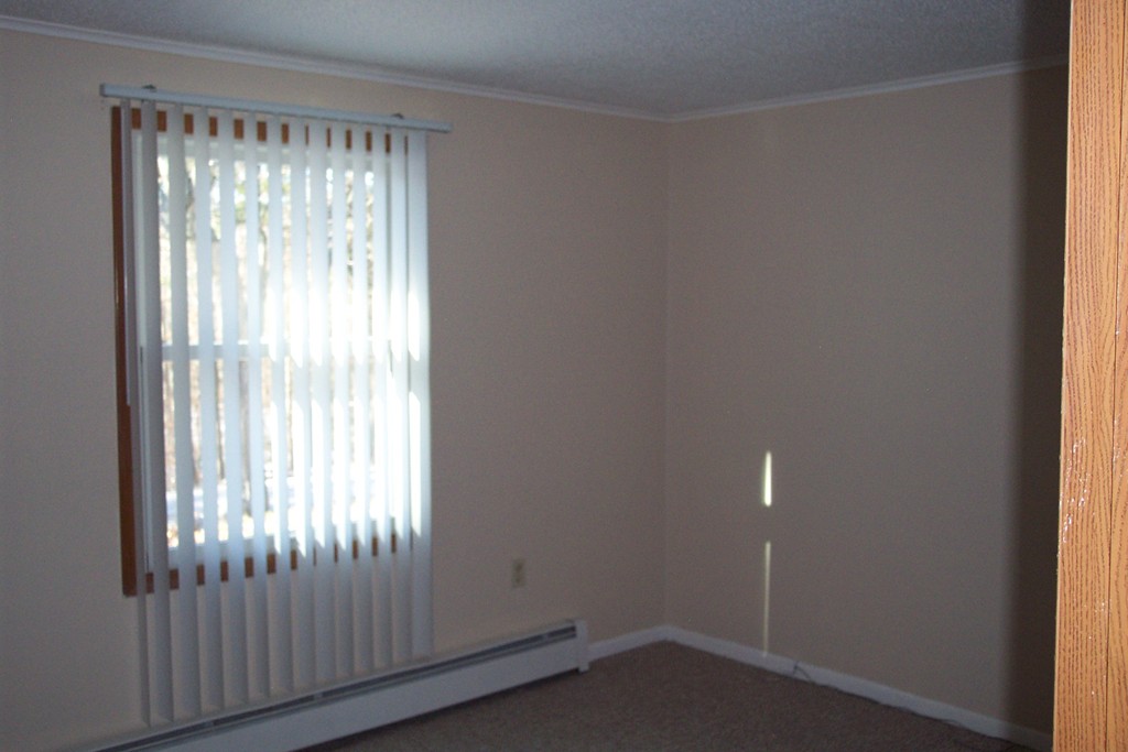 235 Turkey Hill Road Rutland, MA 01543 - Photo 8 of 9 a view of an empty room and window