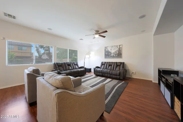 a kitchen with a table and chairs