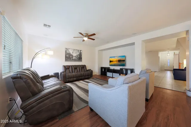 a large dining hall with stainless steel appliances granite countertop a stove and kitchen view