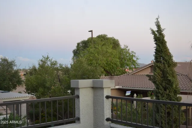 a view of a house with backyard porch and patio