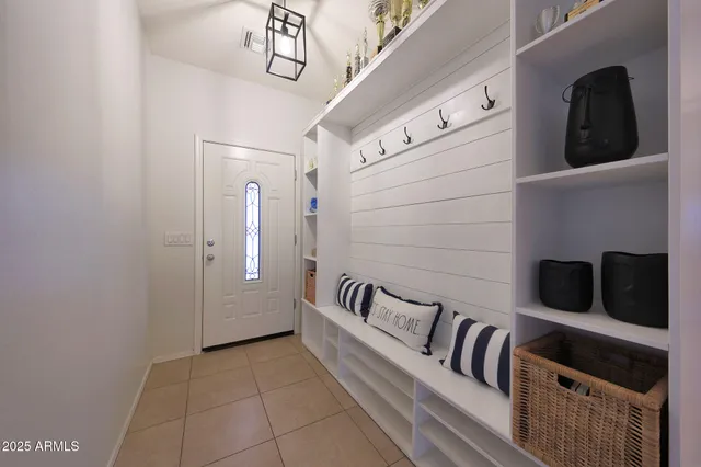 a bathroom with a sink a toilet and shower curtain