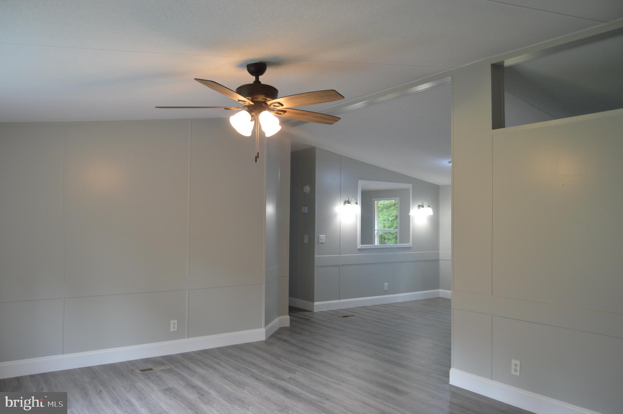 19286 Courtney Road Hanover, VA 23069 - Photo 6 of 23 Living room open to dining and kitchen