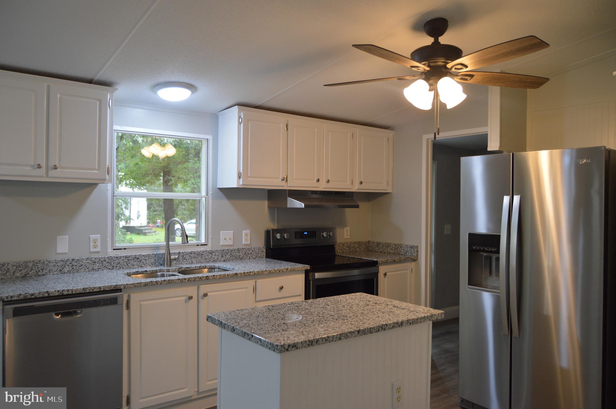19286 Courtney Road Hanover, VA 23069 - Photo 8 of 23 Granite countertop, and stainless appliances